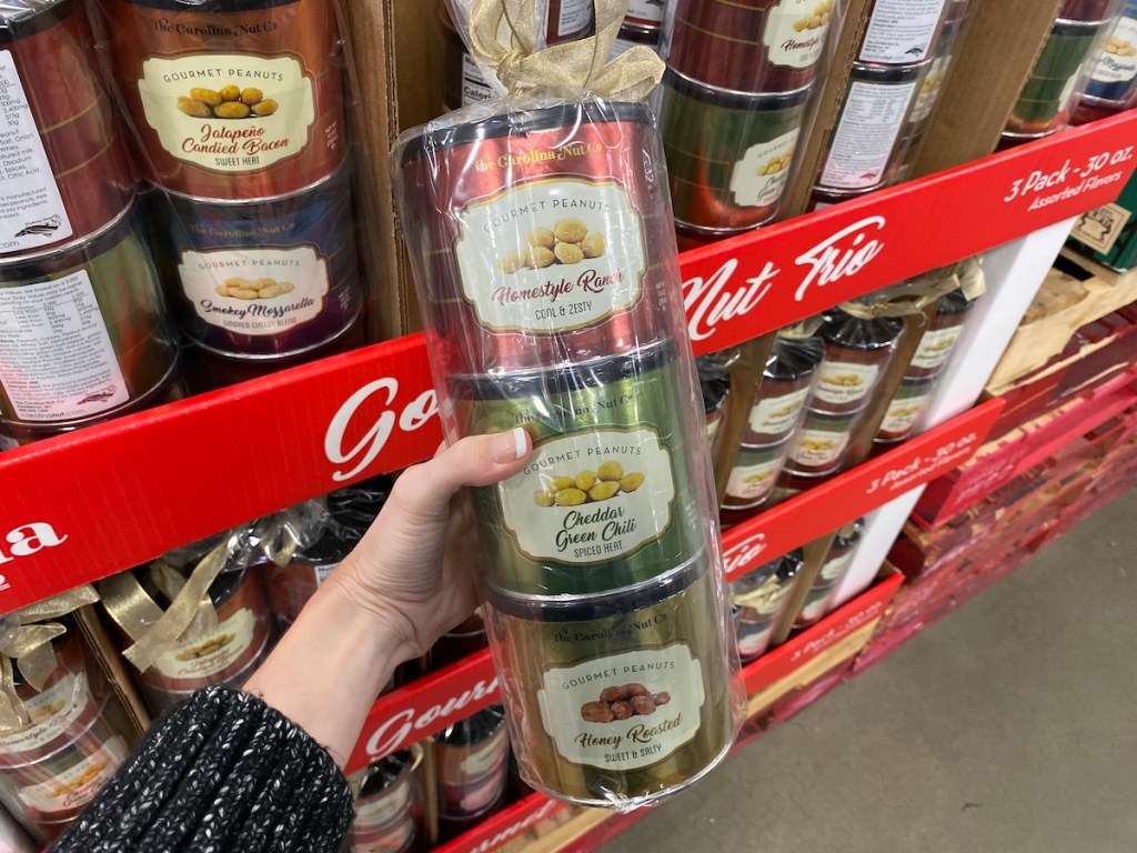 hand holding Carolina Nut Trio gift set at Sam's Club