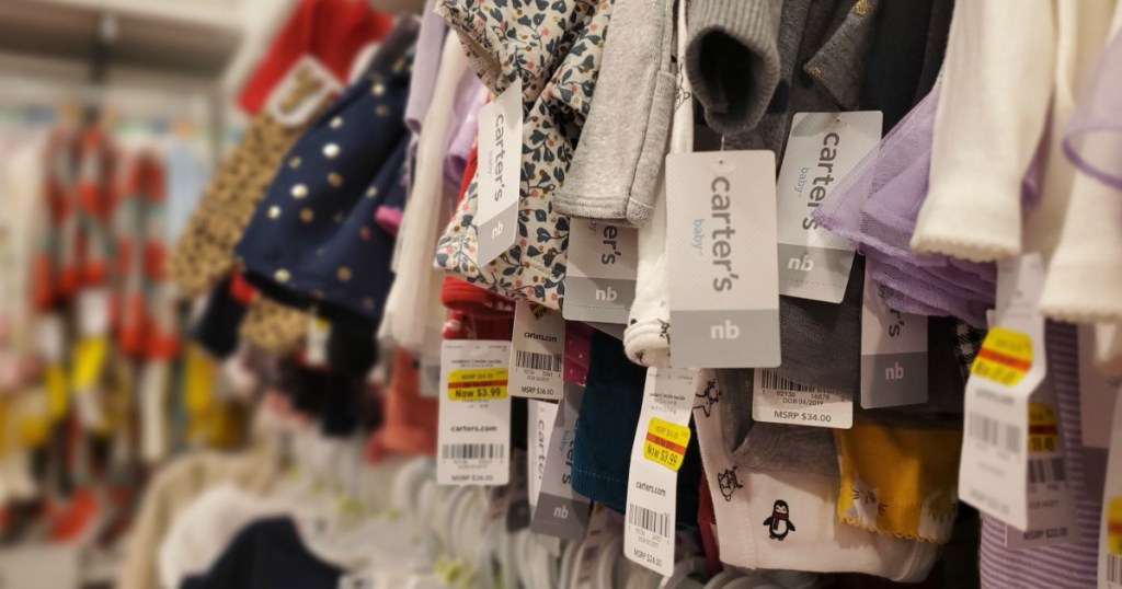 Carter's Clothes hanging on a rack with clearance tags