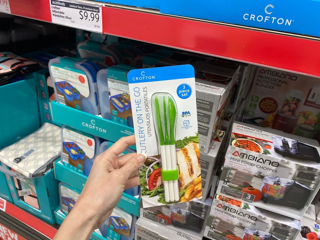 Woman holding Cutlery on the Go in ALDI