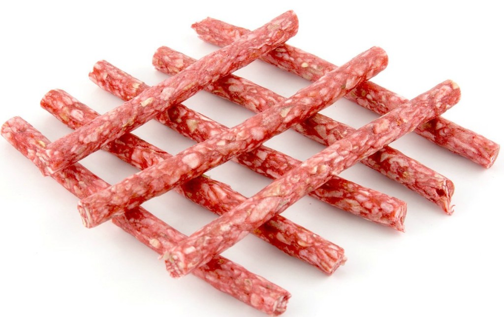 stack of stick-shaped rawhide dog treats