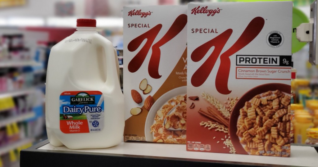 two boxes of kellogg's cereal and milk
