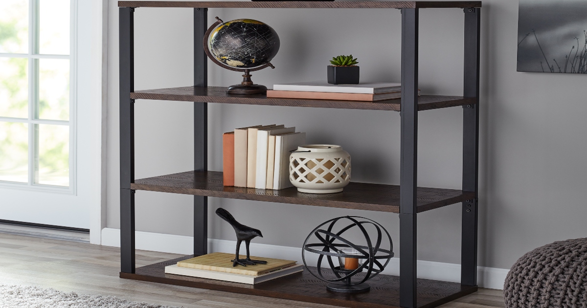 Metal frame bookcase with 4 shelves. decor items or small books on each shelf