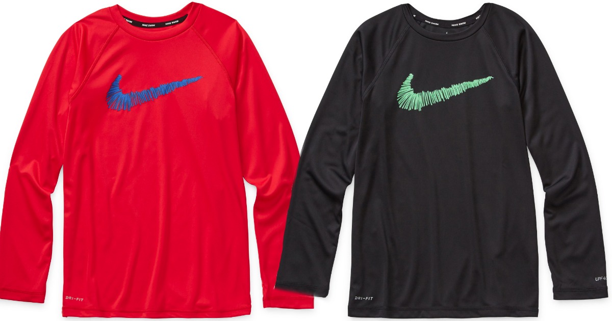 Nike boys Swim Shirts in red and black stock images