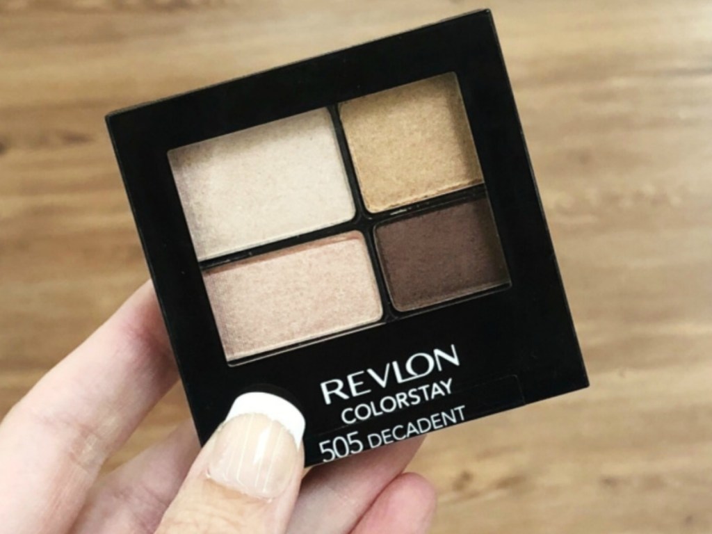 hand holding a Revlon eyeshadow