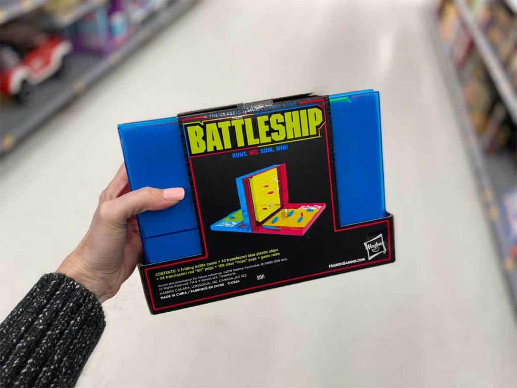 woman holding battleship neon pop game