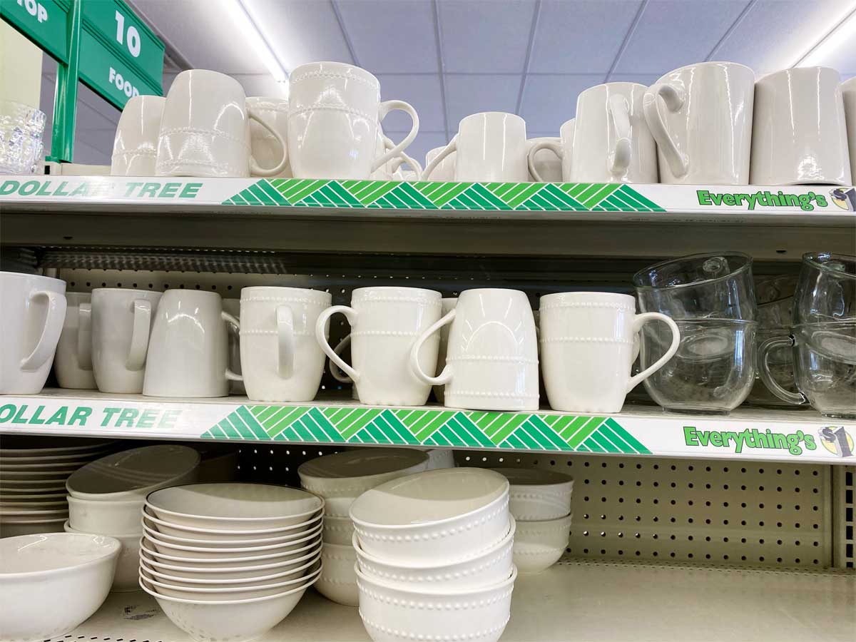 shelf of Royal Norfolk Ceramic White Beaded 12 oz Mugs