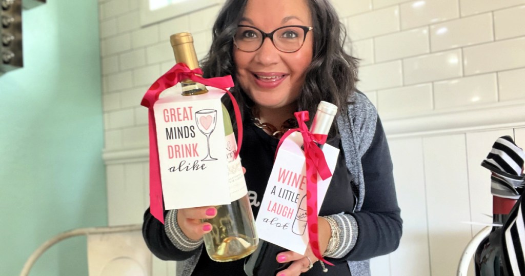 woman holding wine with free printable wine tags