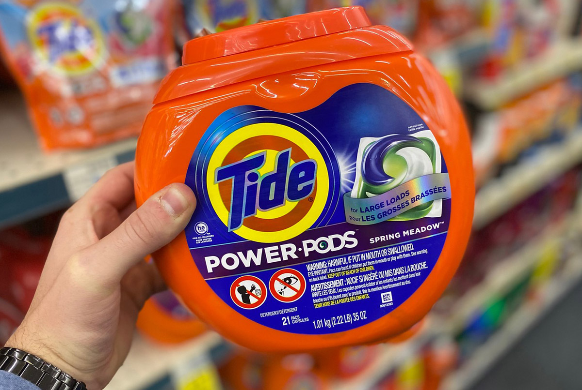 hand holding tide power pods cvs