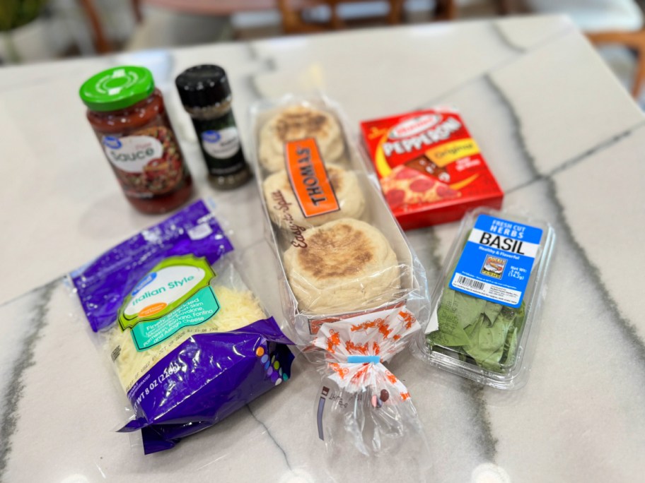 ingredients on the counter to bake simple english muffins pizza