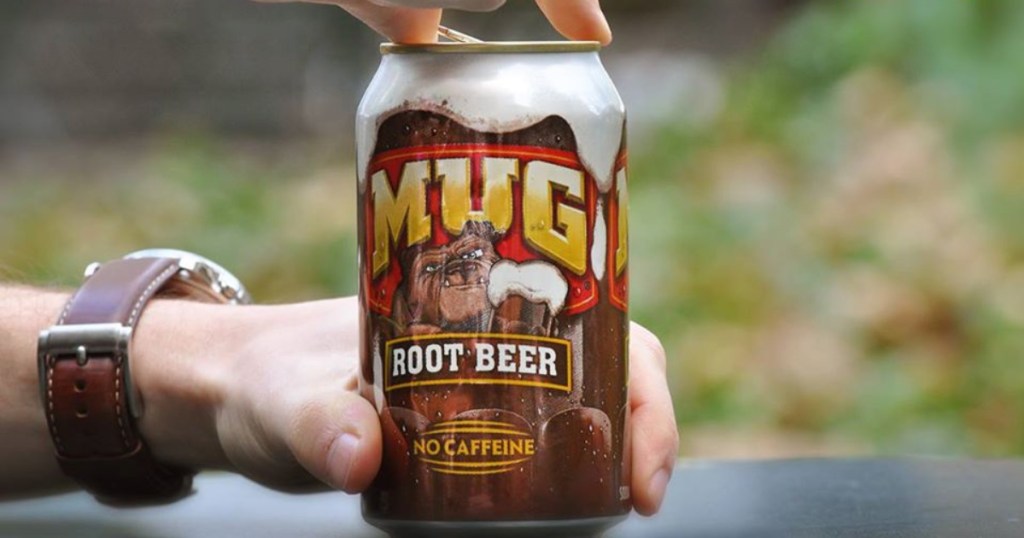 hand opening a can of mug rootbeer