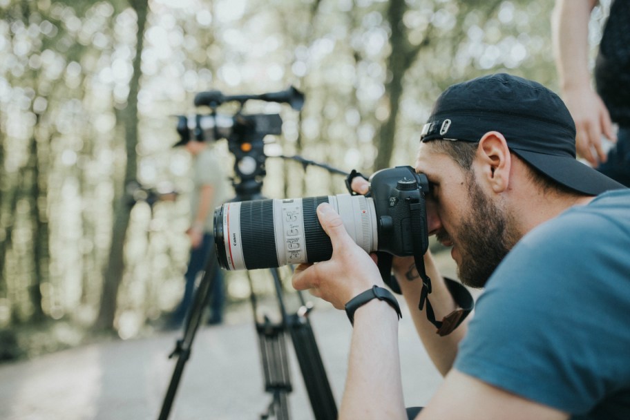 man taking photos