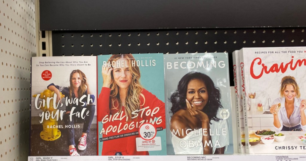 rachel hollis books and michelle obama's book on shelf in store