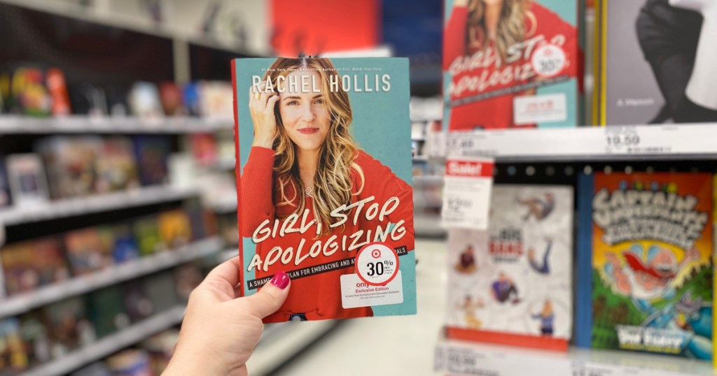 hand holding girl, stop apologizing book in store