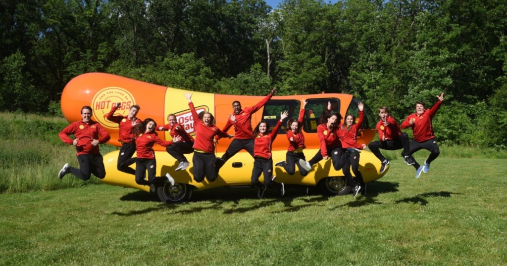 Oscar Meyer Weinermobile with its drivers
