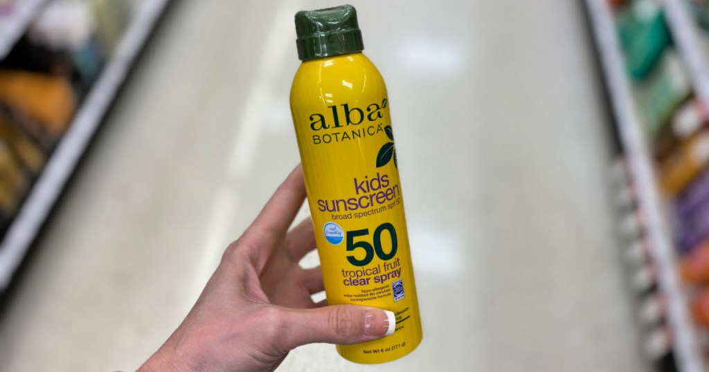 woman hand holding Alba Botanica Kids Sunscreen