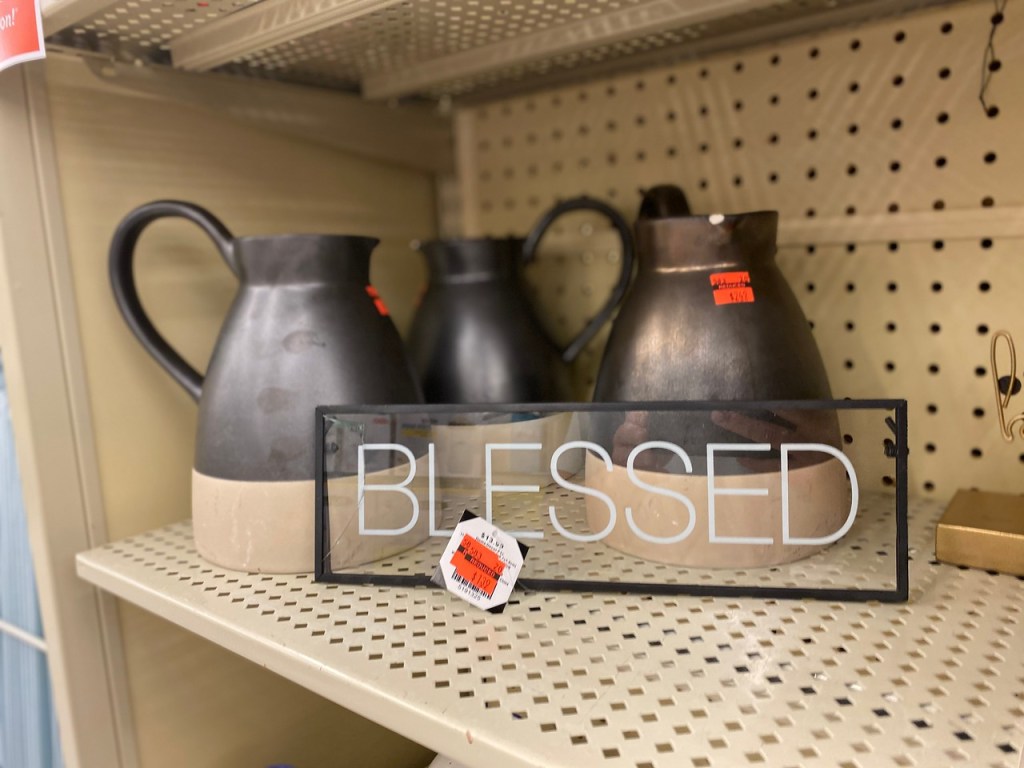 Blessed Sign and Pitchers on store shelf