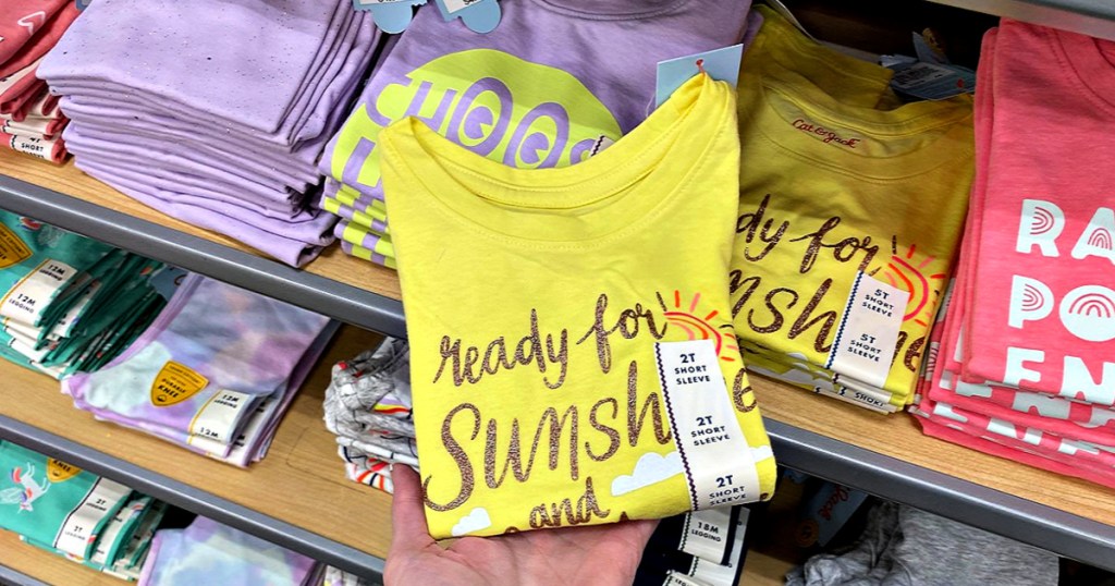 Cat & Jack Toddler Girls' Short Sleeve Sunshine Graphic T-Shirt in hand at target