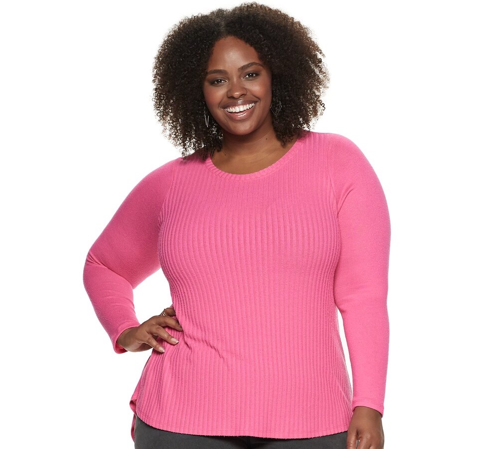 woman wearing a pink long sleeve shirt