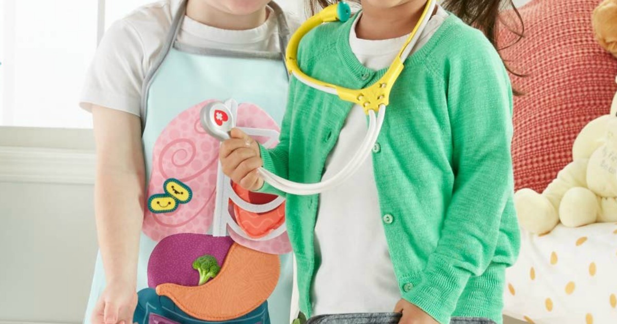 kids playing with doctor and patient play set