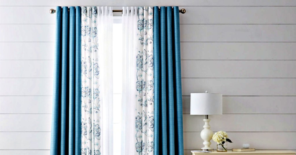 Liz Claiborne Quinn Basketweave Room-Darkening Grommet Top Single Curtain Panel on window in livingroom with lamp