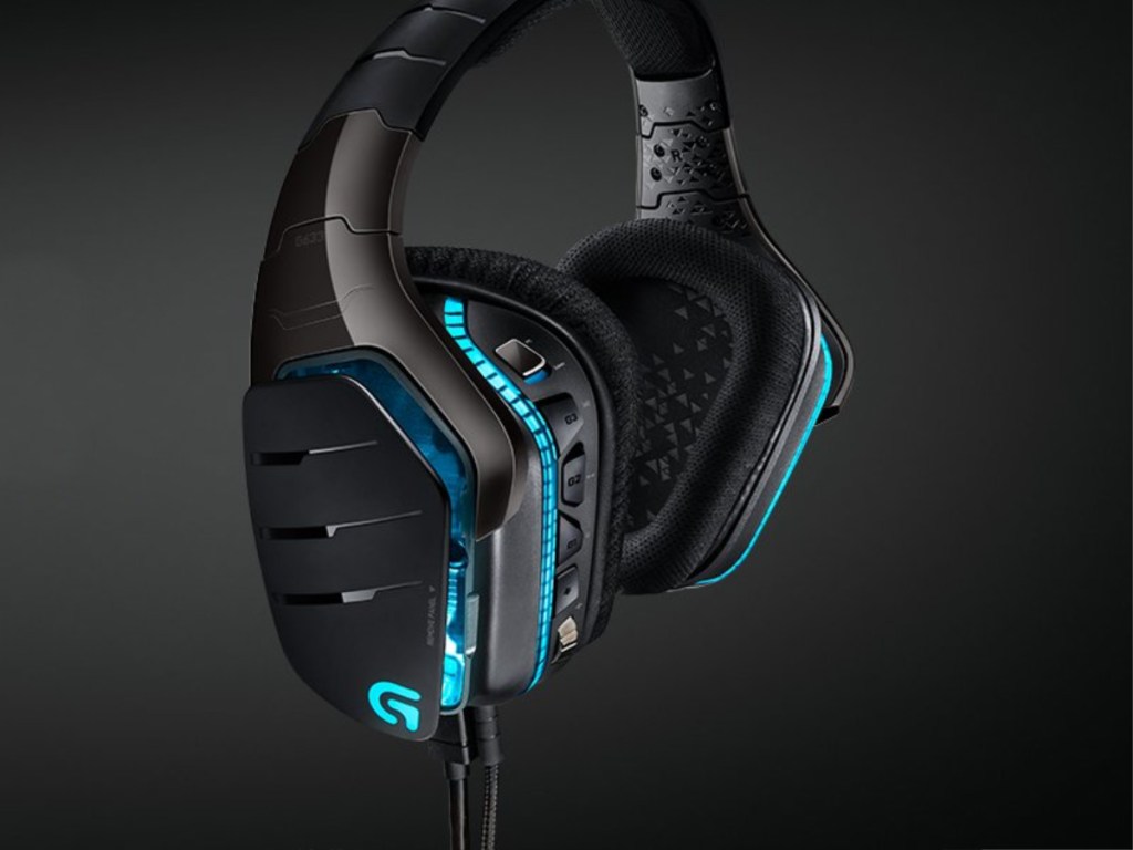 Logitech G633 Artemis Spectrum Headset on black background with blue glowing lights