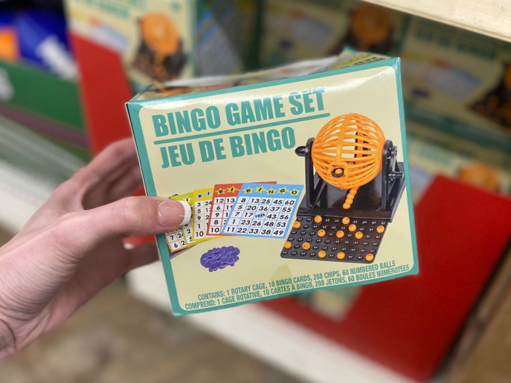 hand holding small box with BINGO game in store