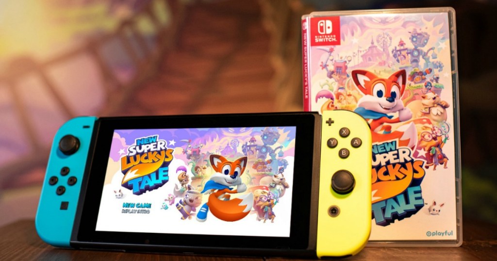 nintendo switch with New Super Luckys Tale Game next to it