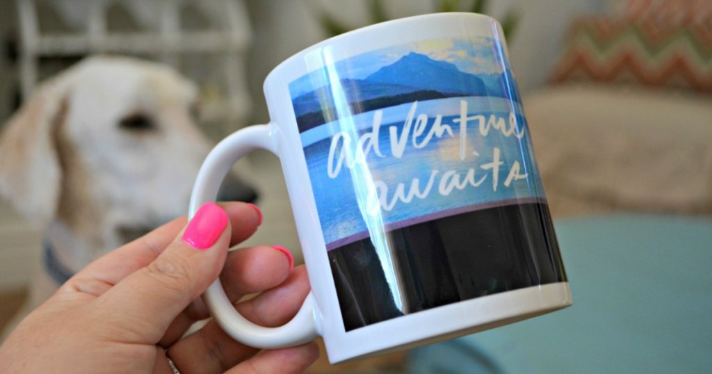 hand holding a custom photo mug