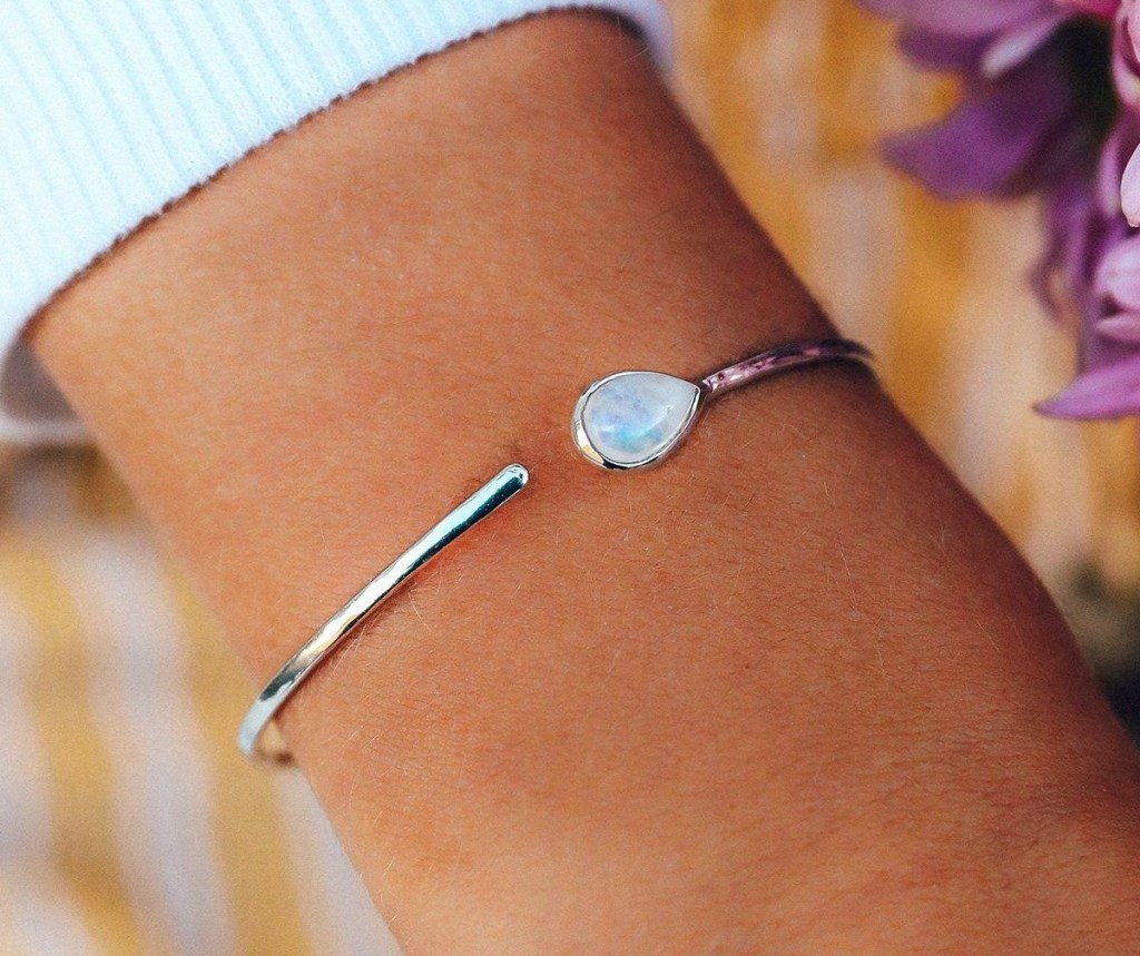 woman wearing Pura Vida Moonstone Cuff