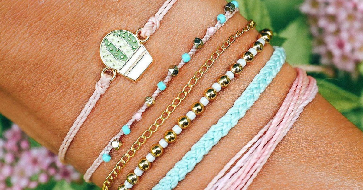 woman wearing Pura Vida succulent pack bracelets