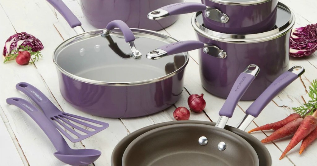 large collection of purple cookware with coordinating glass lids