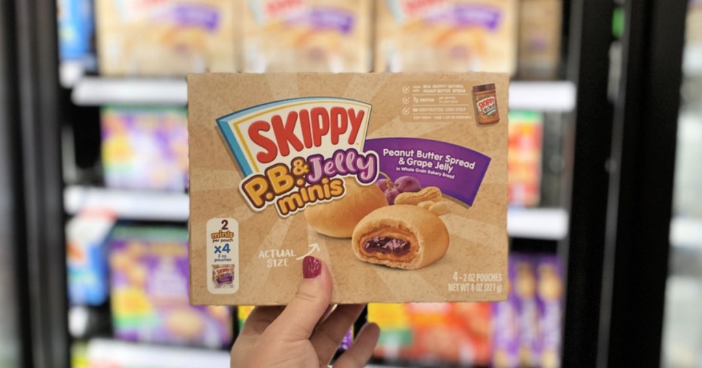 hand holding up natural Skippy P.B. & J Minis Snacks