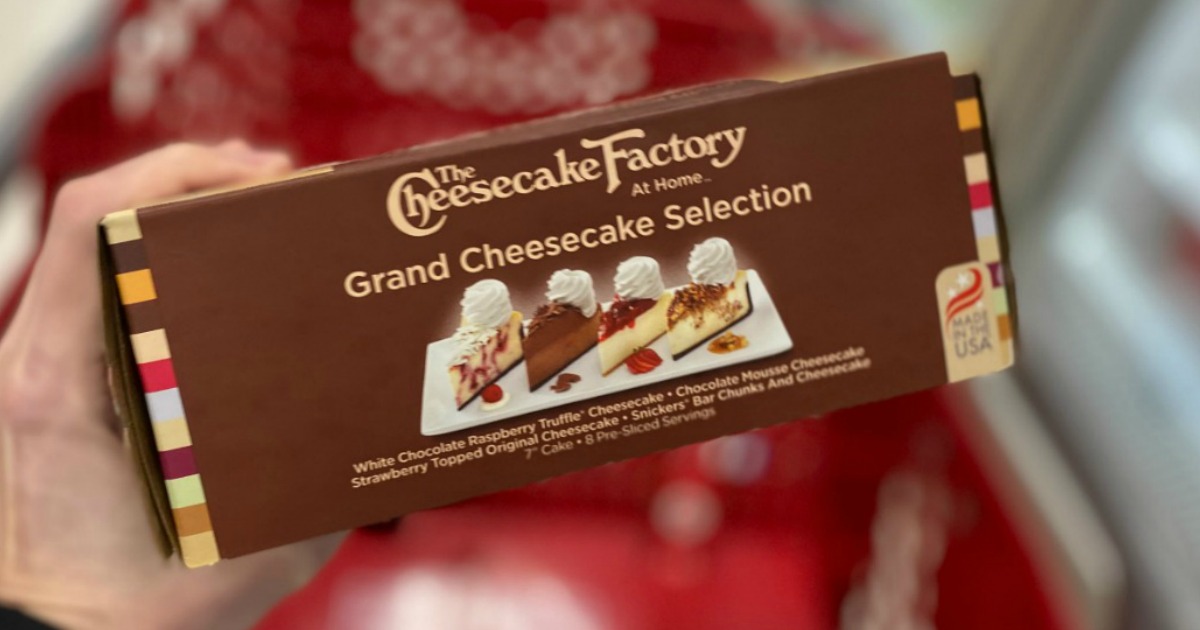 womanholding The Cheesecake Factory Grand Cheesecake Selection