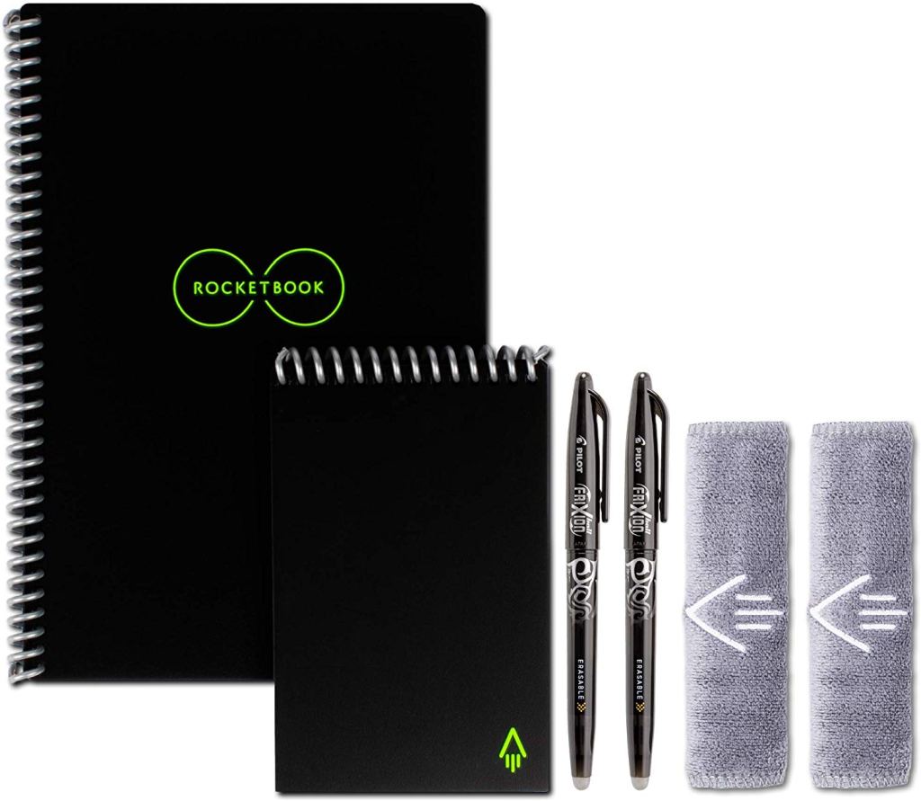 Two notebooks and pens in black, and two microfiber cloths
