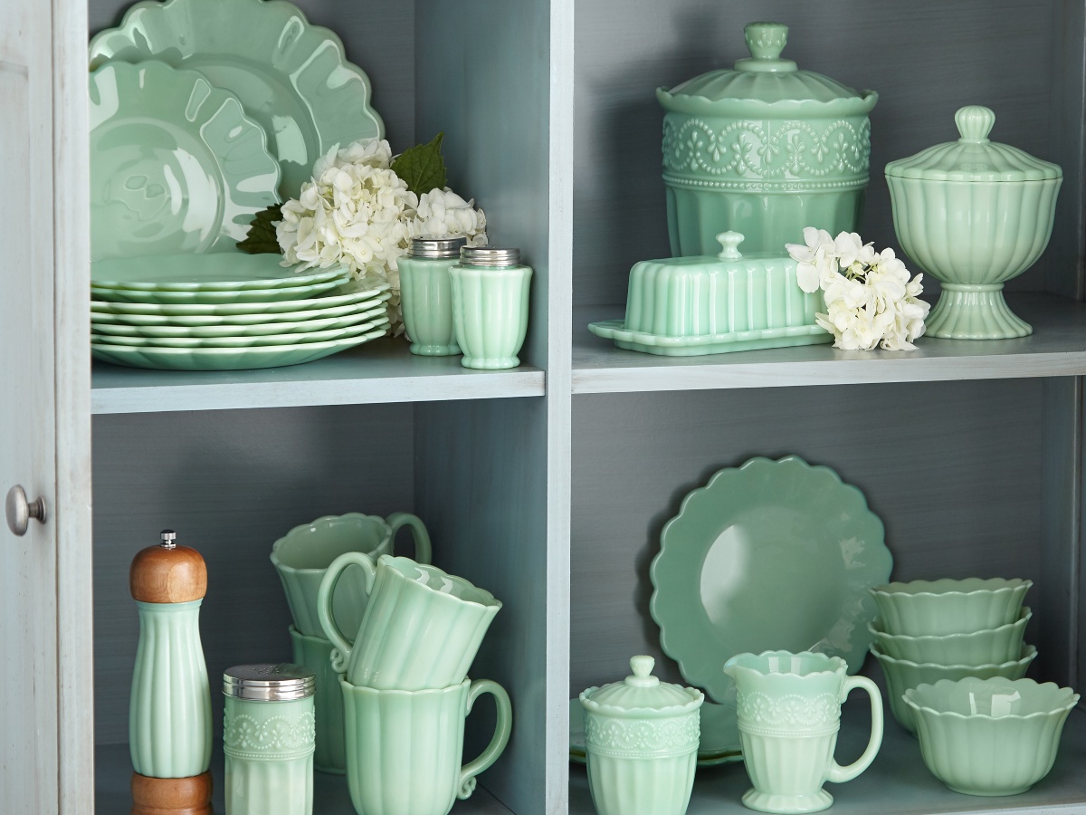 Pioneer Woman jade tabletop collection on gray shelves