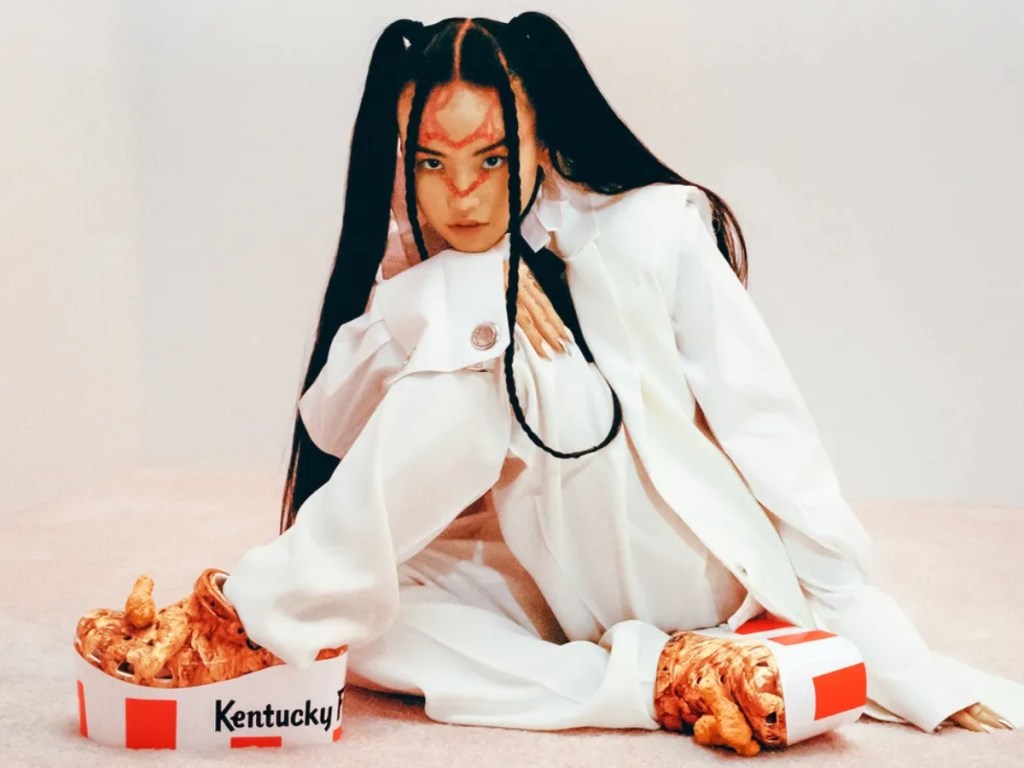 woman modeling KFC platform clogs