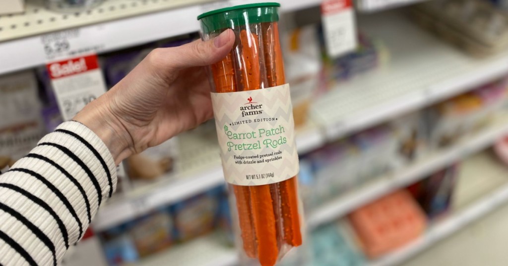 woman holding up Archer Farms Carrot Patch Pretzel Rods