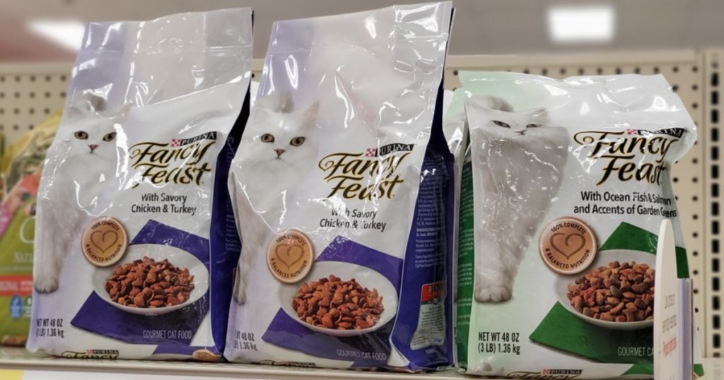 bags of dry cat food on store shelf