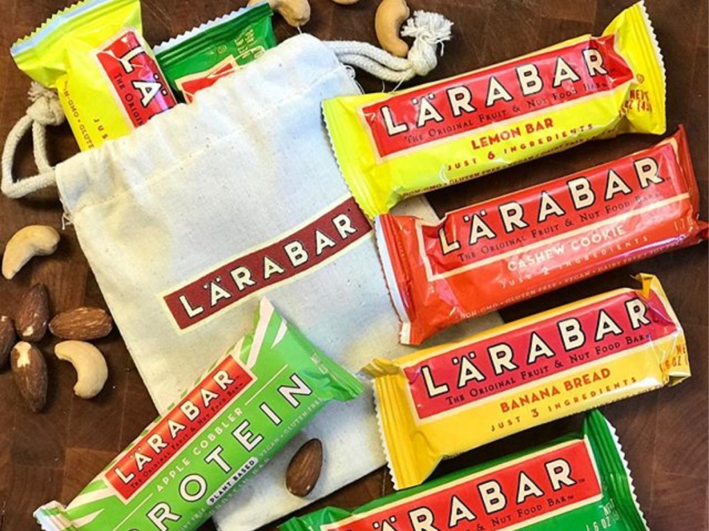 snack bars, bag, and cashews on table