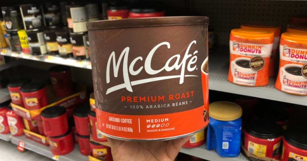 Hand holding McCafe Ground Coffee