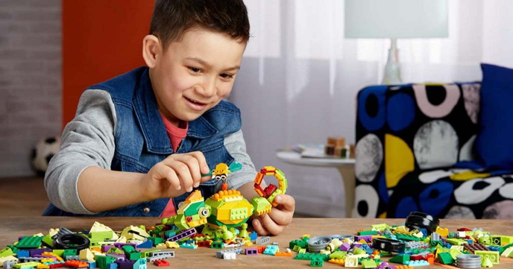 boy playing with building blocks