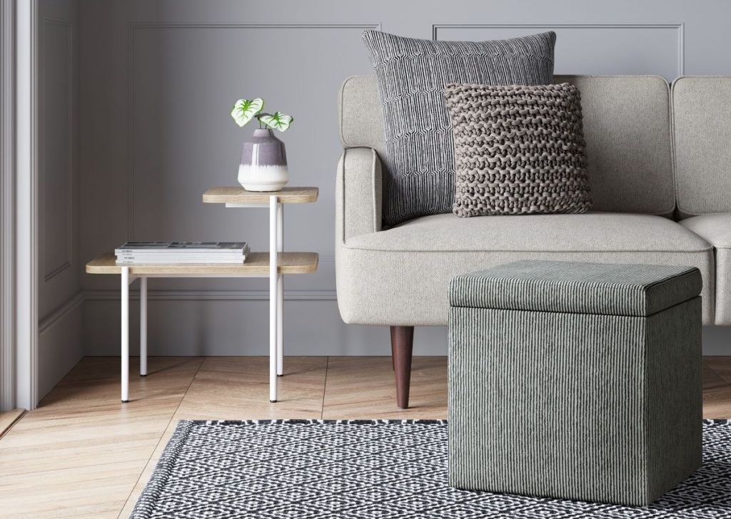 living room with tables and a couch