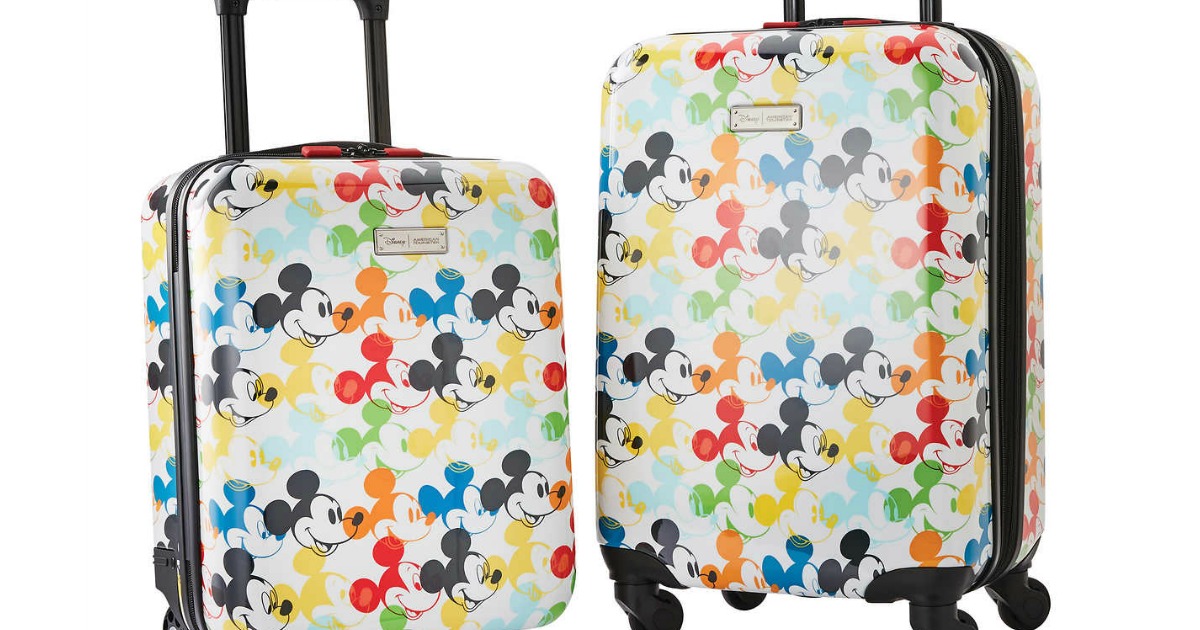luggage featuring colorful mickey mouse cartoon faces