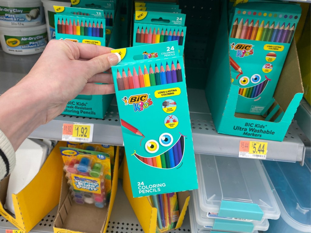 hand holding bic kids colored pencils pack in store