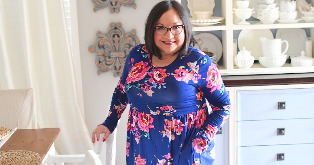 woman wearing bright blue and pink floral amazon spring dress