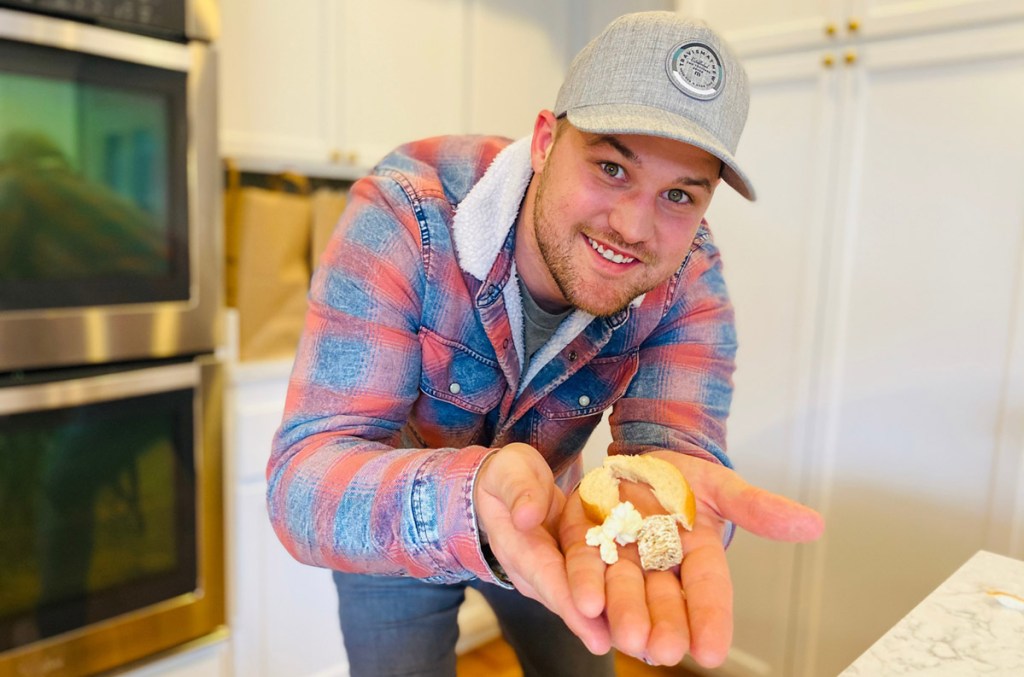 man holding food