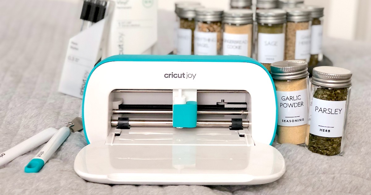 bright blue and white printer with spices in jars sitting next to and behind it