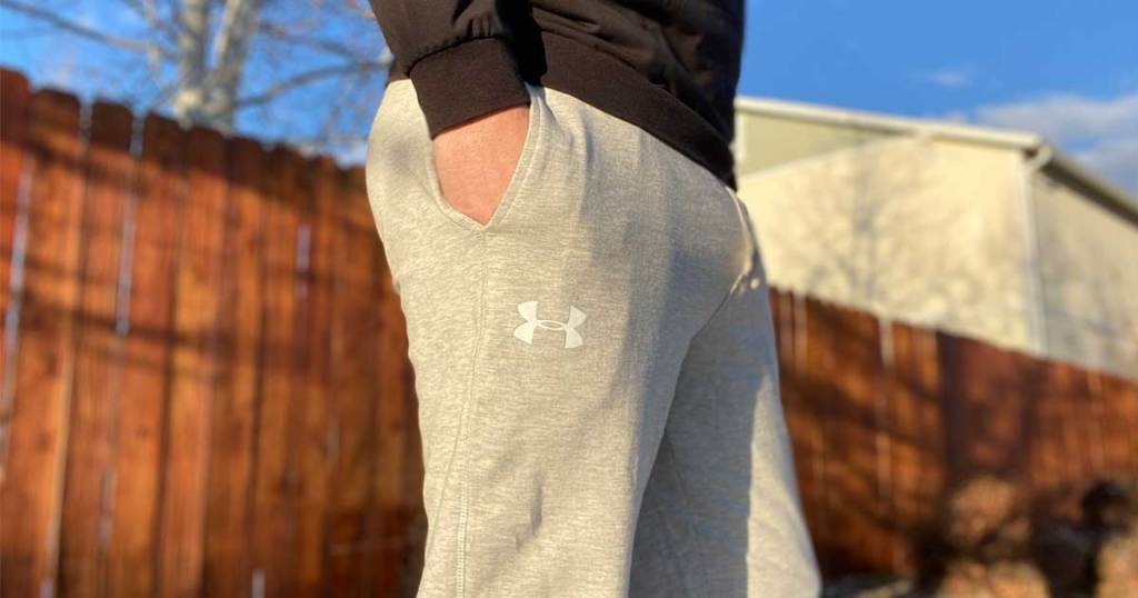 man wearing heather gray joggers outside