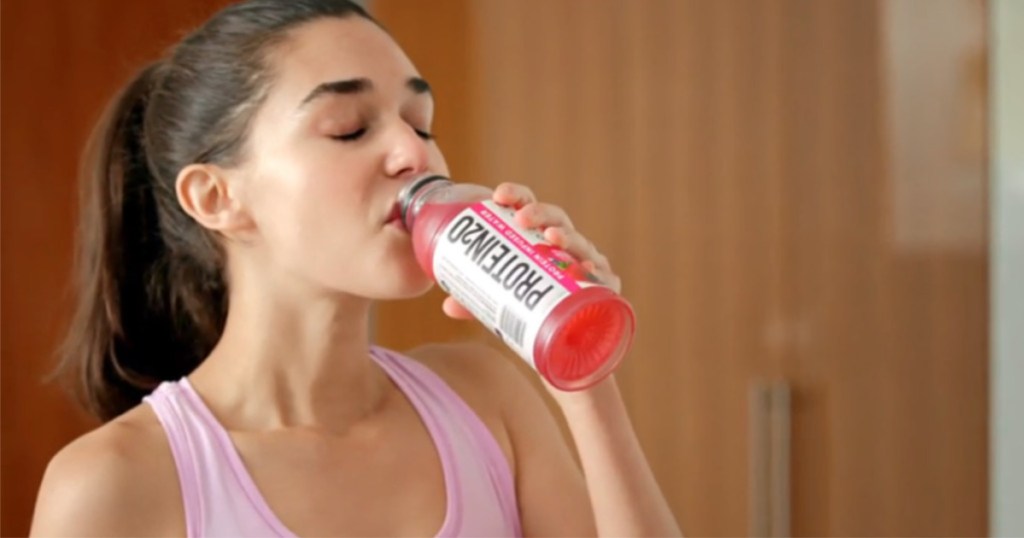 woman drinking protein2o