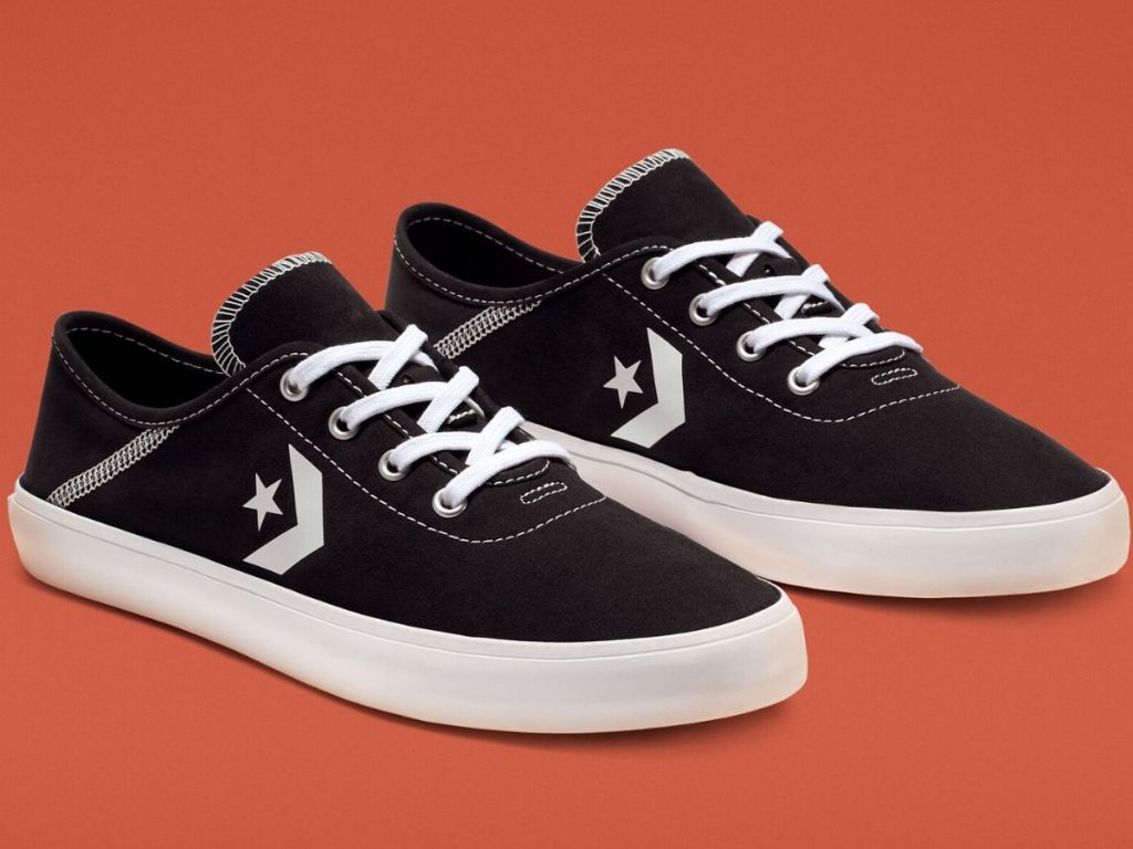pair of womens low top converse sneakers